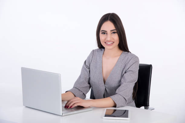 istock Smiling always looks good to new clients. 1128324934