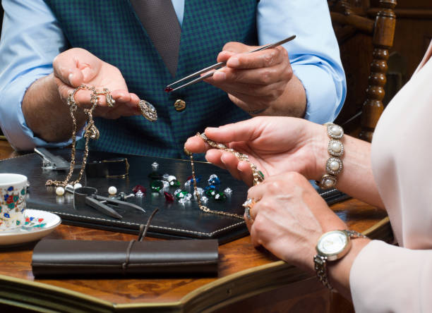 istock Consumerism- customers choosing gift in a jewelry store 1128342798