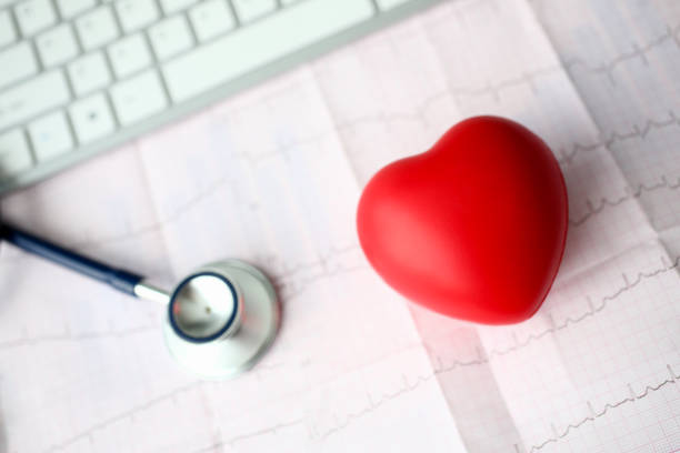 istock Medical stethoscope head and red toy heart 1128343840