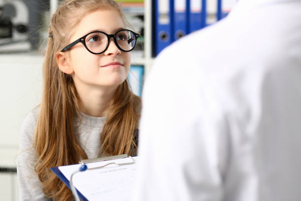 istock Little child at pediatrician reception 1128343897