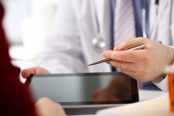 istock Female doctor hands hold and show digital 1128343915