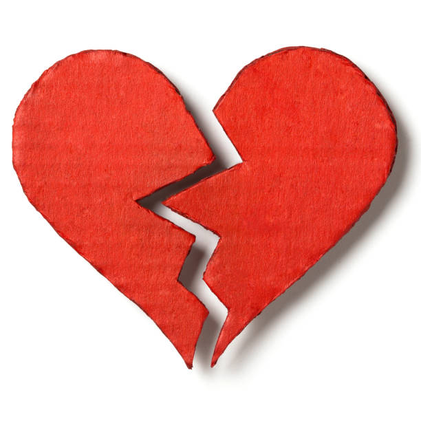 istock Valentine's Day. Red broken heart isolated on white background. Cut out 1128343973