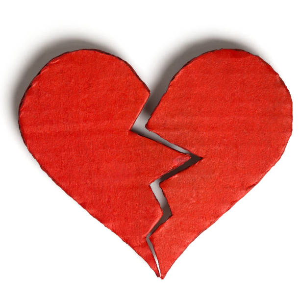 istock Valentine's Day. Red broken heart isolated on white background. Cut out 1128344018