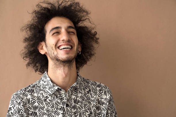 istock Portrait of smiling young man 1128345198