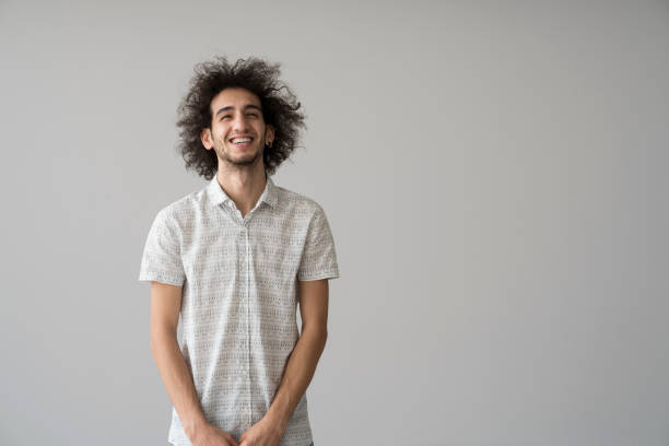 istock Portrait of smiling young man 1128345229