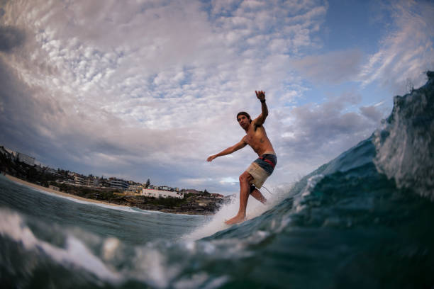 istock Young surfer at Tamarama Beach 1128363622