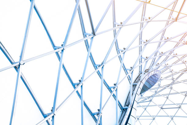istock building construction of metal steel framework outdoors background and texture 1128363625