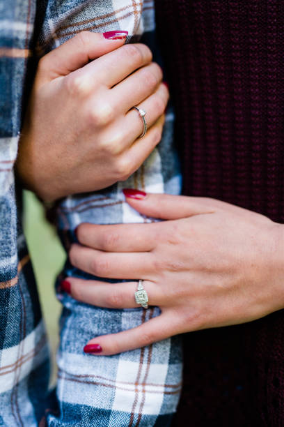 istock Close-up of woman's hand with engagement ring 1128363745
