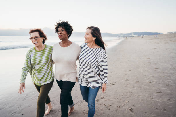 istock Active seniors enjoying time together on the beach 1128367690