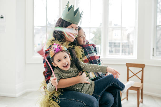 Kids playing with mom