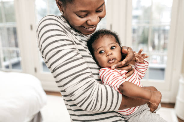 istock mom and newborn baby 1128372403