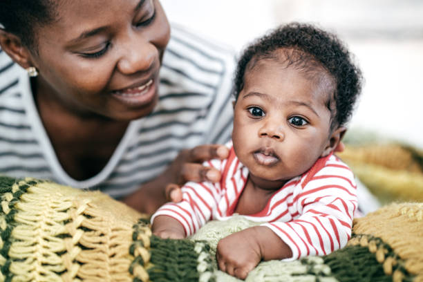 istock Mom and baby at home 1128372413