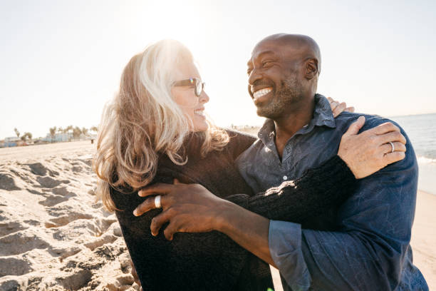 istock Senior couple laughing together 1128372571