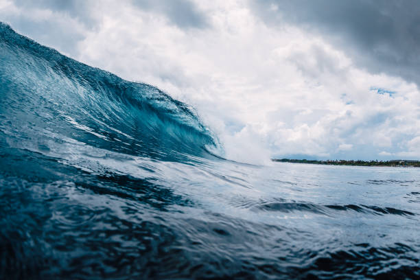 istock Blue wave in ocean. Breaking wave in Oahu 1128377161