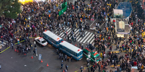 istock Pedestrians crosswalk at Shibuya district 1128377279