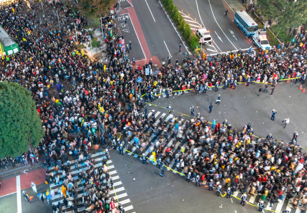 istock Pedestrians crosswalk at Shibuya district 1128378380