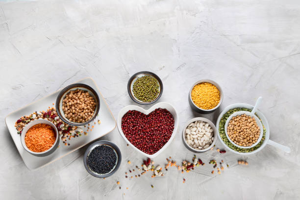 istock Assortment of colorful legumes. 1128380439