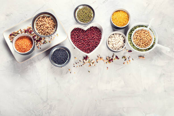 istock Assortment of colorful legumes. 1128380442