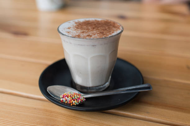 istock Chai latte in glass mug at cafe 1128385821