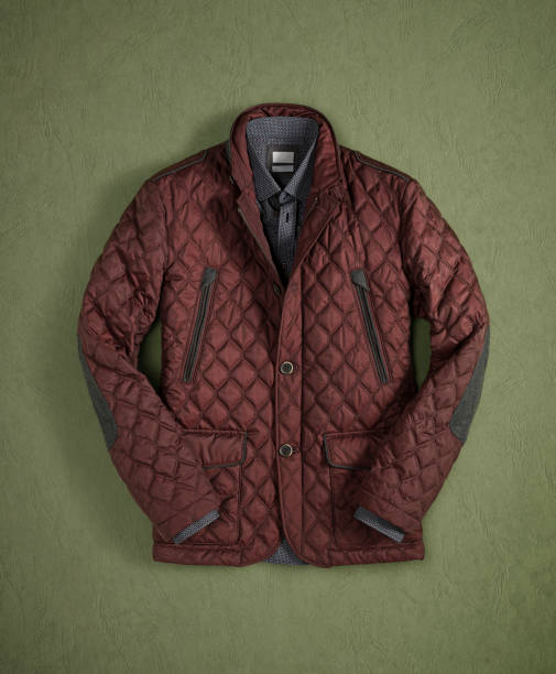 istock Men’s coat with shirt isolated on green background 1128387808