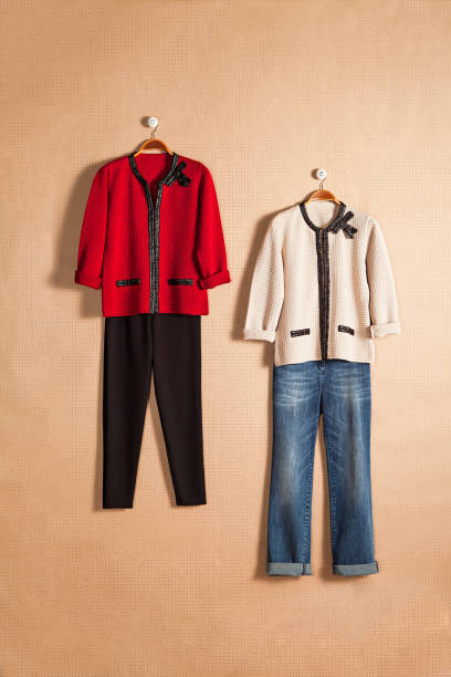 Women’s clothing on hanger isolated on beige background