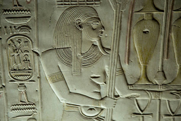 istock Egyptian hieroglyphs inside a temple 1128389582