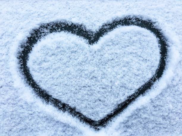 istock Heart drawn on the snow 1128391793