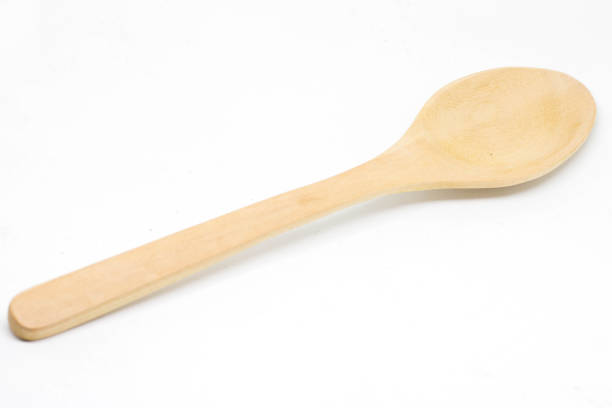 istock Wooden Spoon isolated on a white background 1128392975