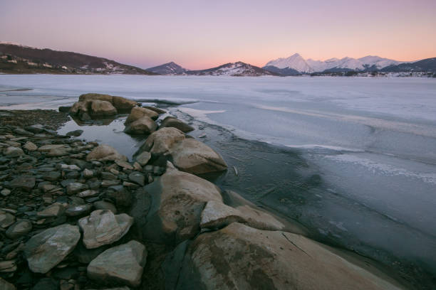 istock Mountain frozen lake in Abruzzo at dusk 1128393066