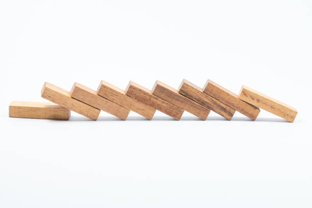 istock Wood block stacking Business Concept Domino Effect 1128393165