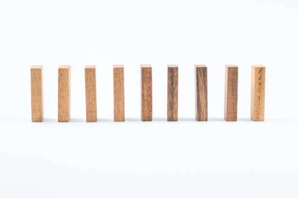 istock Wood block stacking Business Concept Domino Effect 1128393209