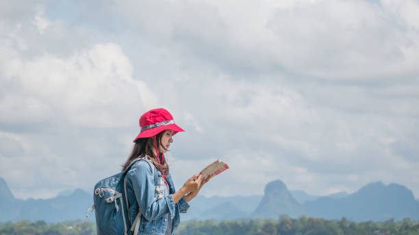istock Asian woman traveler 1128395695