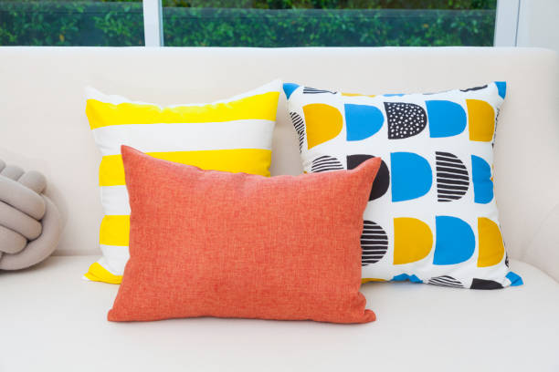 istock Modern living room with colorful pillow. 1128396300