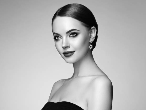 istock Beautiful woman face with perfect makeup 1128401136