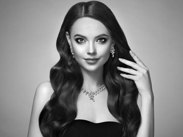 istock Brunette woman with curly hair 1128401646