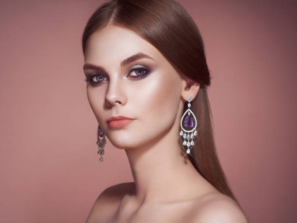 istock Brunette woman with long shiny smooth hair 1128401739