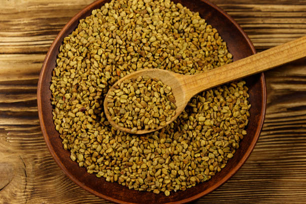 istock Fenugreek seeds in ceramic plate on wooden table 1128402194
