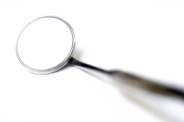Abstract high key image of dental mirror