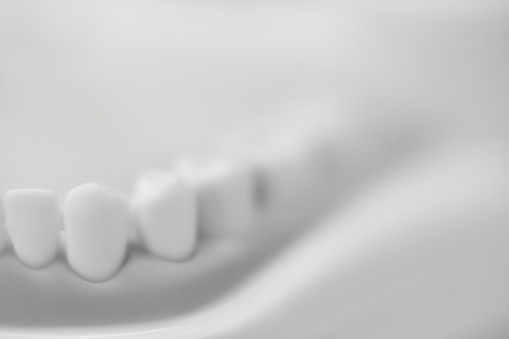 Abstract high key image of denture moulding