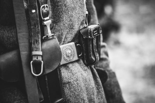 Soldier's belt on the uniform of the German soldier Gomel, Belarus - November 26, 2016: Belt with a badge of a German Wehrmacht soldier. German army uniform of the Second World War. Black and White Photographing nazism photos stock pictures, royalty-free photos & images