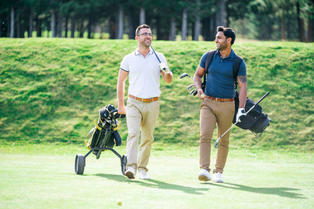 istock Friends Playing Golf on a Beautiful Sunny Day 1128412068