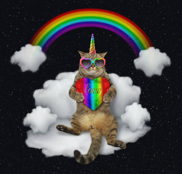 istock Cat unicorn with the color heart on a cloud 1128413189