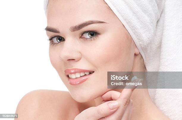 Woman Applying Moisturizer Cream On Face Stock Photo - Download Image Now - Adult, Adults Only, Applying