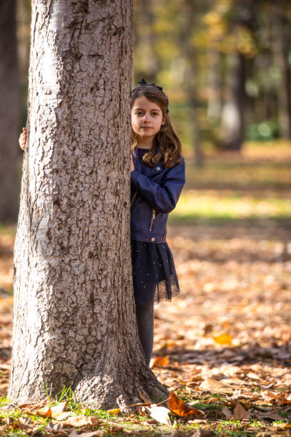 istock Girl in the park 1128420727