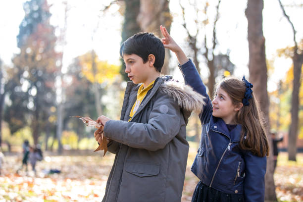 istock Two brothers in the park 1128420737