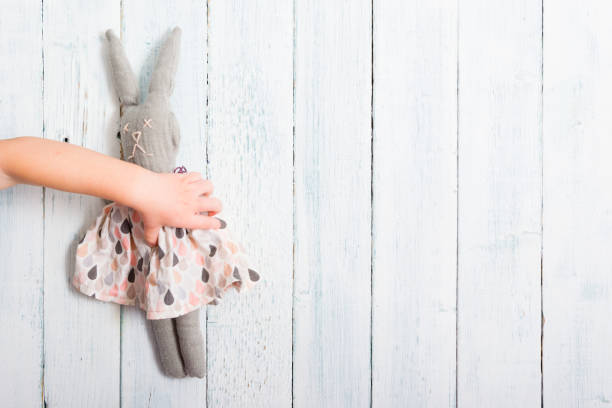 istock Baby hand touch toy rabbit doll 1128427331