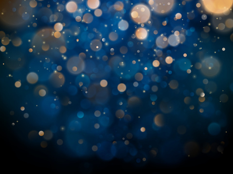 Blurred bokeh light on dark blue background. Christmas and New Year holidays template. Abstract glitter defocused blinking stars and sparks. EPS 10 vector file