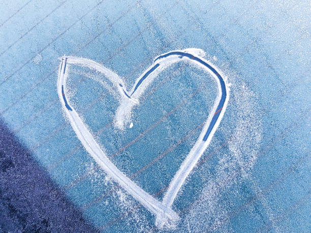 istock A heart scratched into the ice on a windshield 1128436126