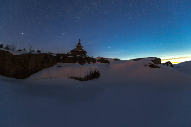 Winter night on Lake Ladoga. church. Winter night on Lake Ladoga. Church on the island. Old wooden architecture. скала stock pictures, royalty-free photos & images