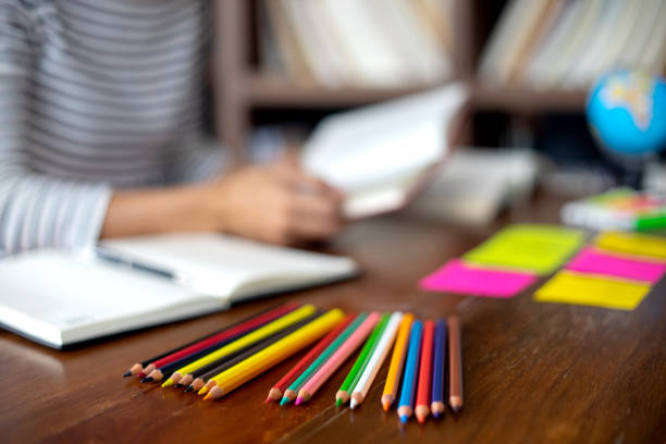 istock woman and man work for education or business on the table 1128438053